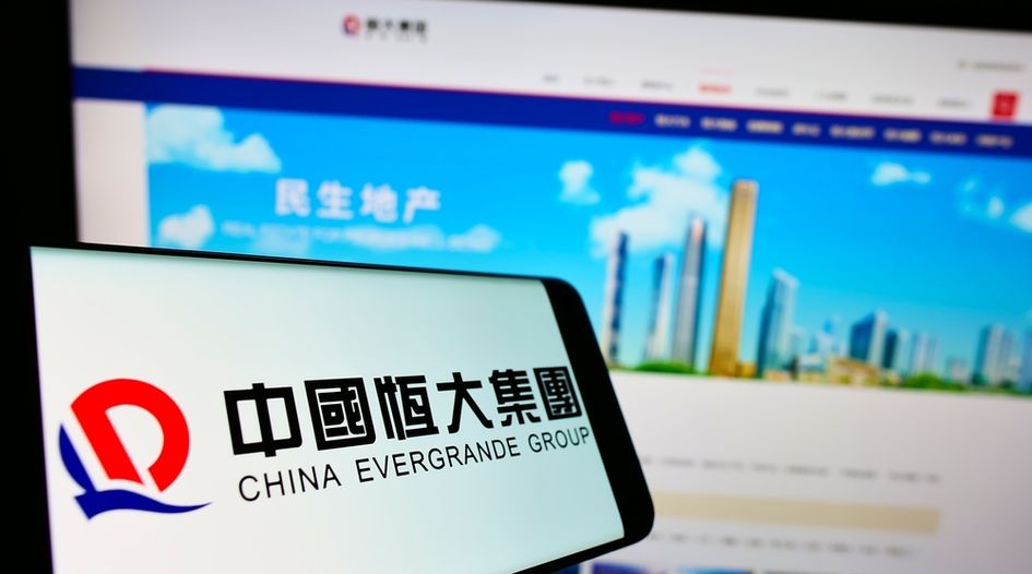 Evergrande in default as Cayman insolvency filing looms