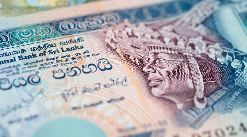Bondholder sues Sri Lanka in US as foreign investors form creditor group