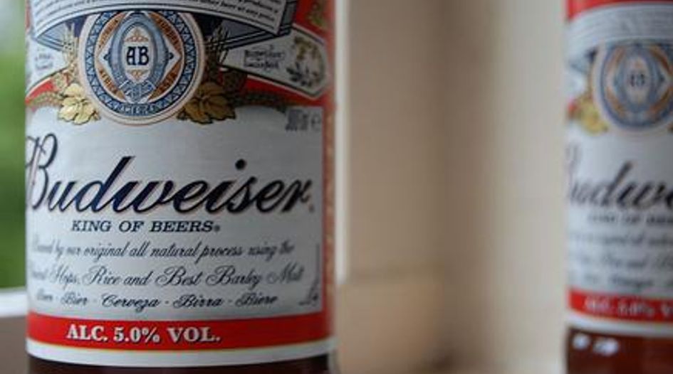 DoJ sues to block ABI's bid for Grupo Modelo