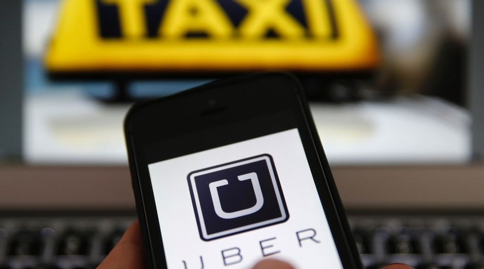 Taxis bring price-fixing charges against Uber