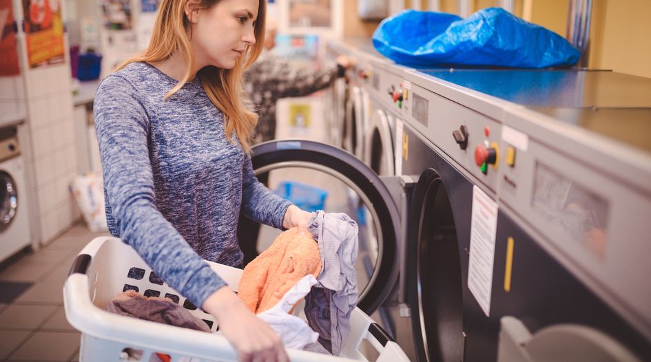 UK orders laundry company to unwind merger