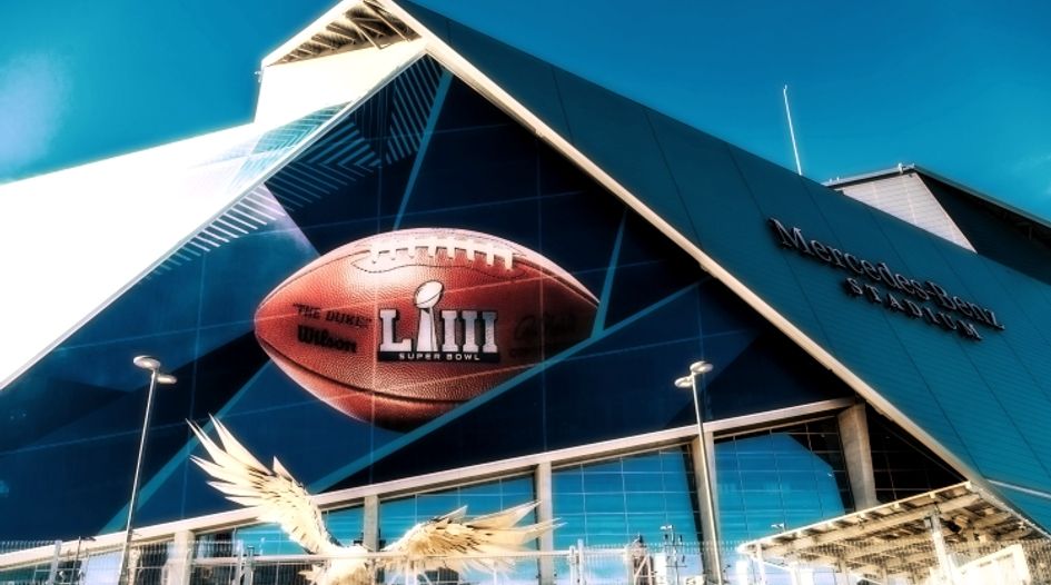 Law enforcement crack down on counterfeit Super Bowl merchandise