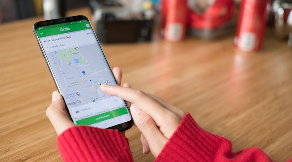 Philippines fines Grab and Uber