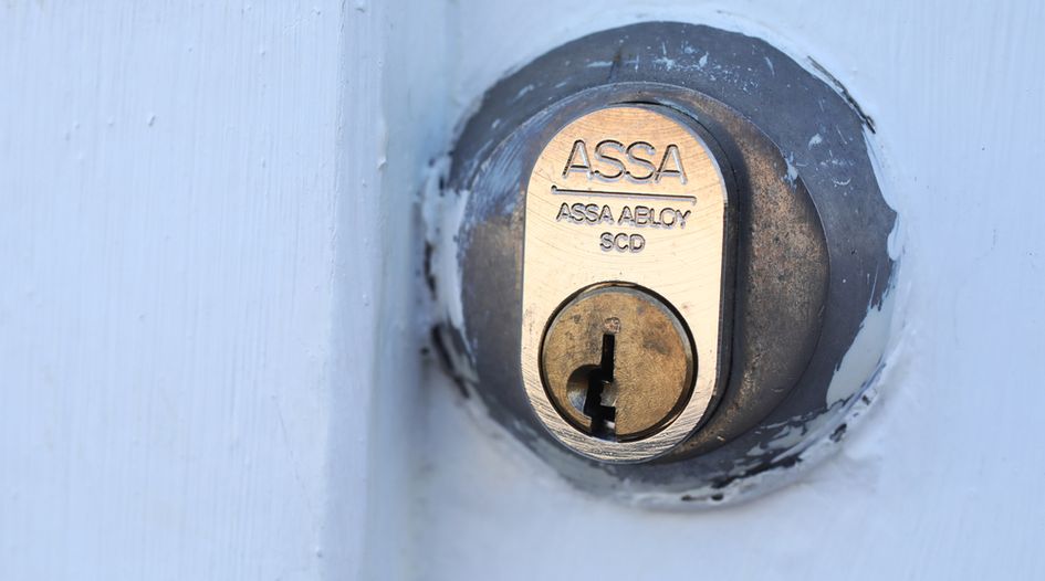 DOJ tries to close door on three-to-two lock merger - GCR USA