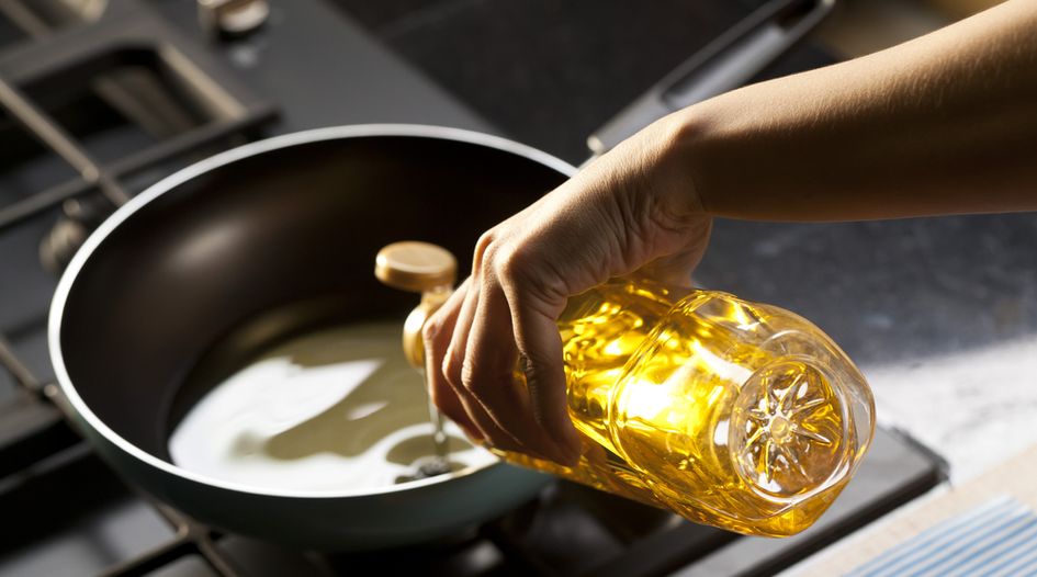 Indonesia fines cooking oil cartel, drops claims against 20 companies