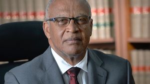 “Three heads should be better than one!”: an interview with Justice Sir Anthony Smellie KC